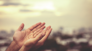 God's grace is a gift. Hands held out to receive grace from heaven.